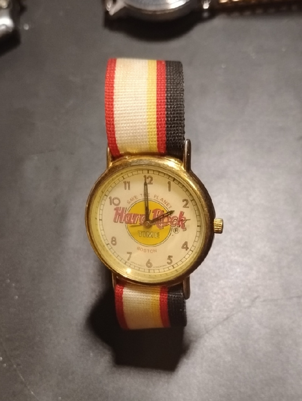 Hard Rock Time Gold-Tone Watch with Red, Yellow, Black Stripe Strap